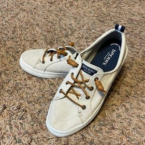 EUC Sperry slip-on tennis shoes.  Light tan canvas with leather and navy accents